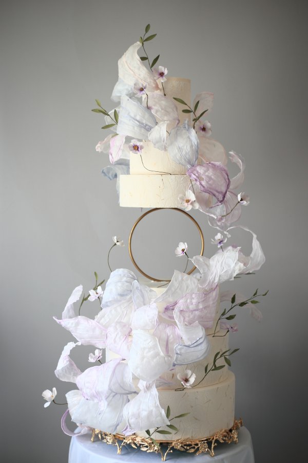 الإبداع في حلقة تربط قالب حلوى زفاف بشرى مرير