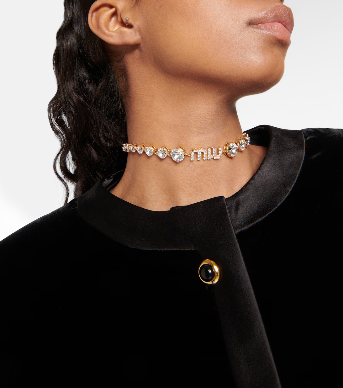 إكسسوار فضي وذهبي من Miu Miu
