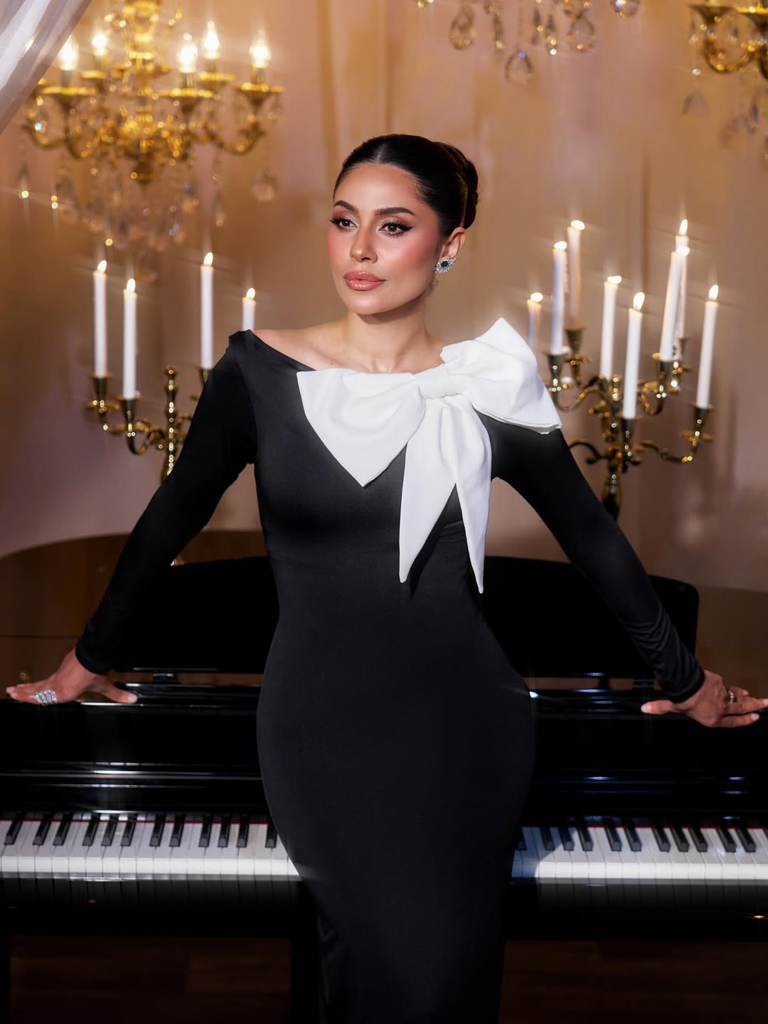 إلهام علي بفستان مجسم طويل باللون الأسود