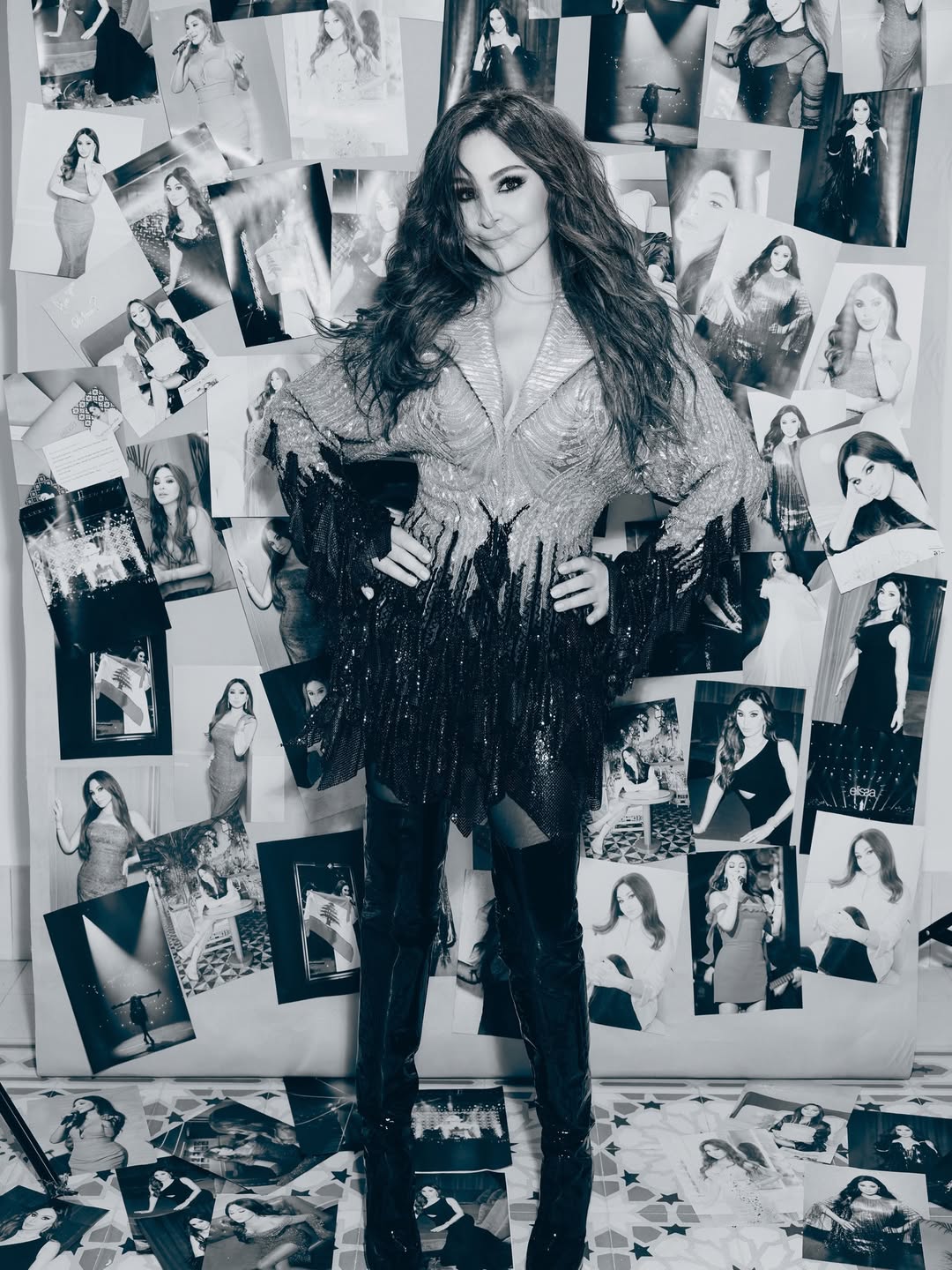 إليسا مرتدية فستانا قصيرا مصمم بقصة مجسمة