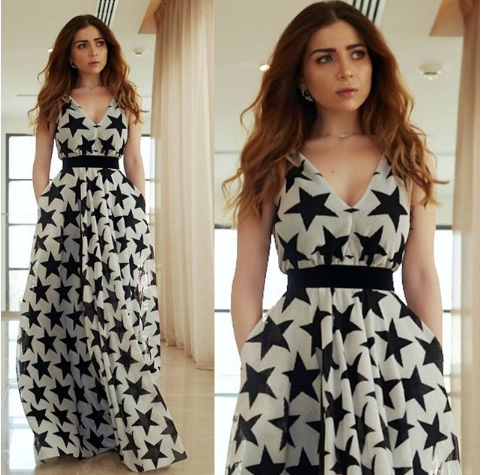 اطلالة مي عز الدين بفستان باللونين الابيض والاسود