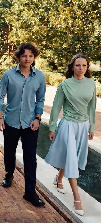 الأميرة سلمى بتنورة ميدي فضفاضة باللون الأزرق الفاتح مع بلوزة أنيق باللون الأخضر الباستيل