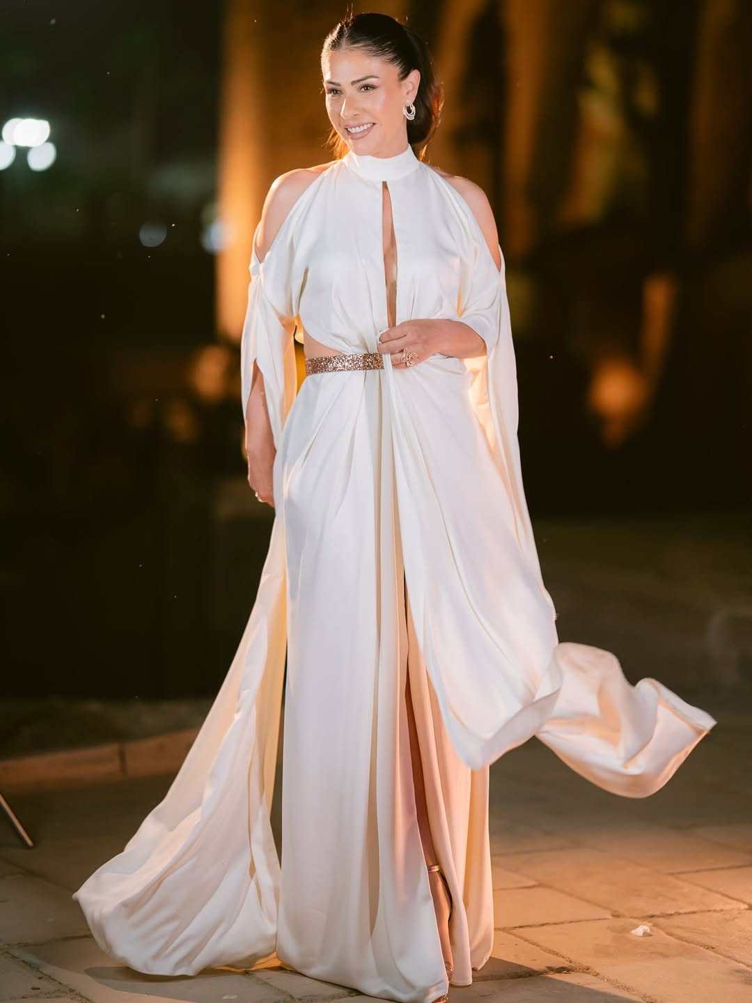 بسمة حسن ترتدي فستانا رقيق بصيحة الـCut out