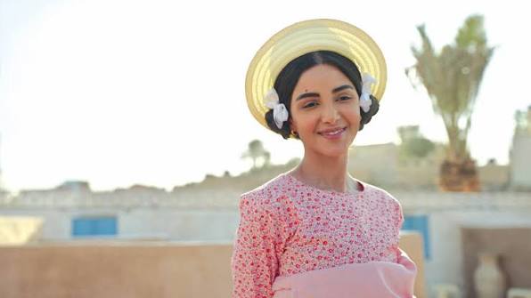 عزيزة في شارع الأعشى