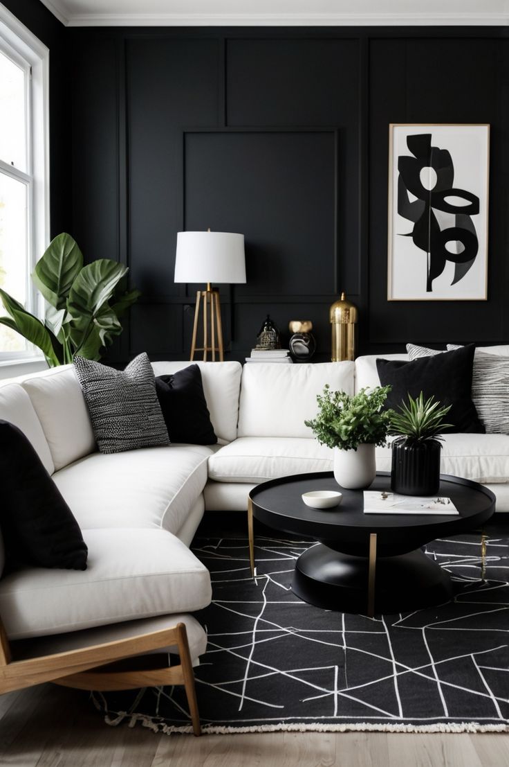 غرفة معيشة بجدران باللون الأسود وأثاث أبيض