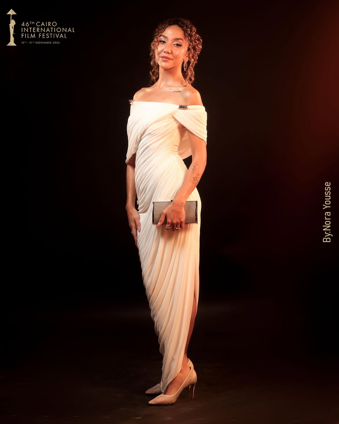 فستان ابيض من زينة عبد الباقي في مهرجان القاهرة