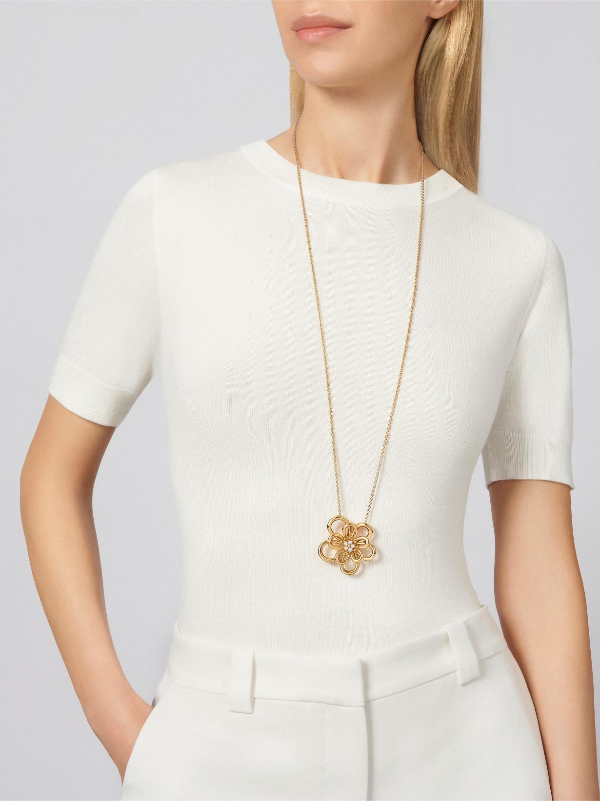 قلادة Flowerlace clip من Van Cleef & Arpels