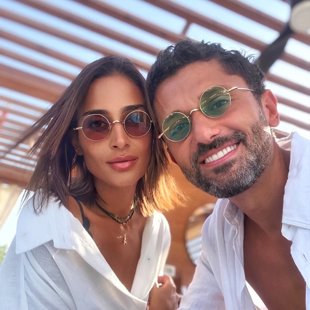 صور لـ كريم محمود عبدالعزيز وزوجته بعد شائعات الانفصال