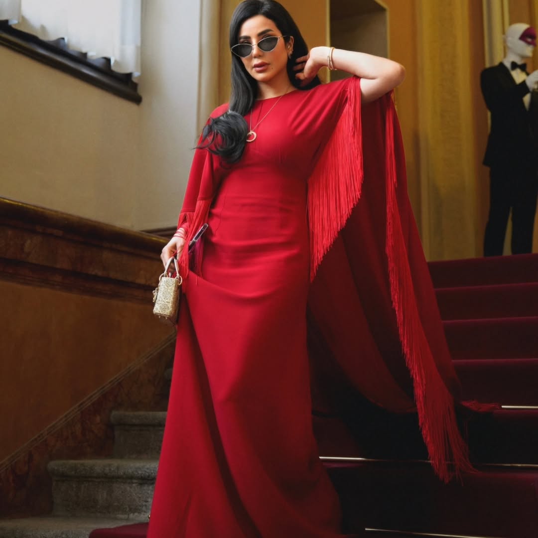  لجين عمران بفستان طويل تميز بلونه الناري الموحد