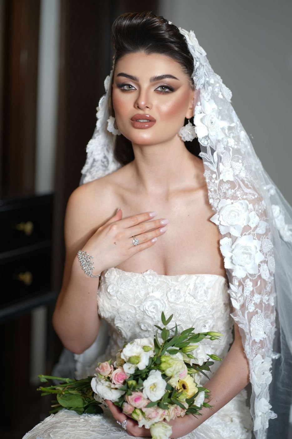 من تصاميم المجموعة الجديدة من علامة دار إلهام