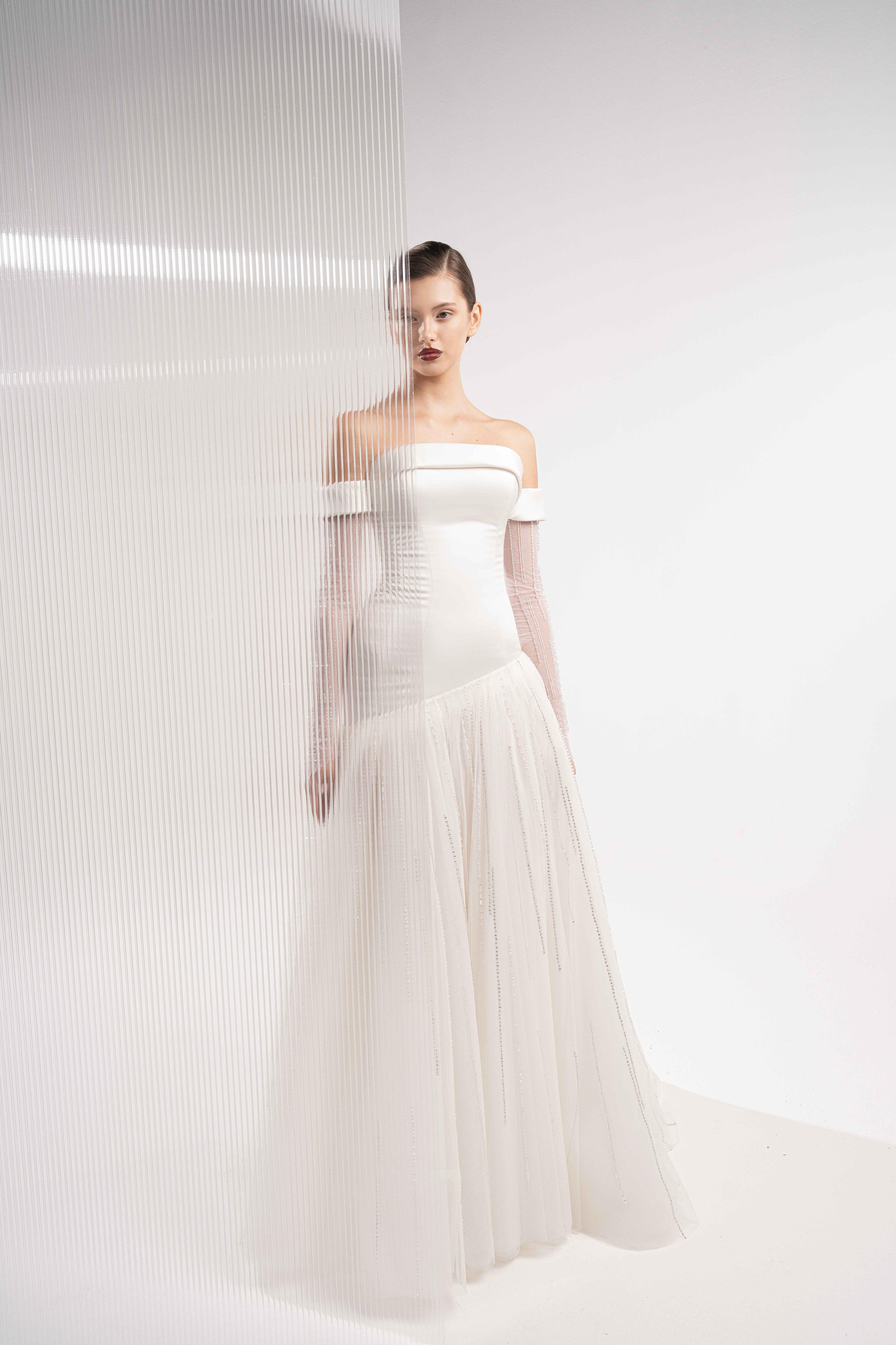 من مجموعة unveiled لفساتين زفاف RTW