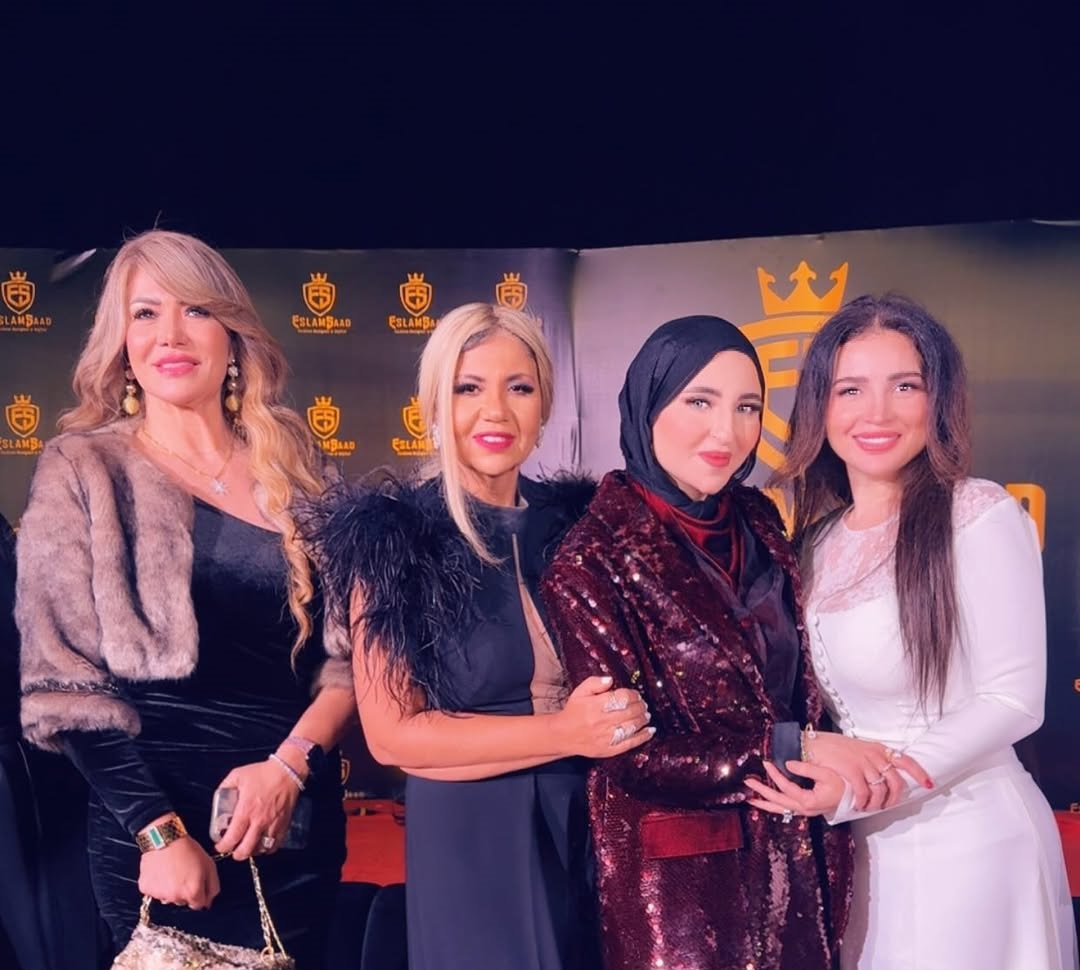 مي عز الدين بالفستان الأبيض