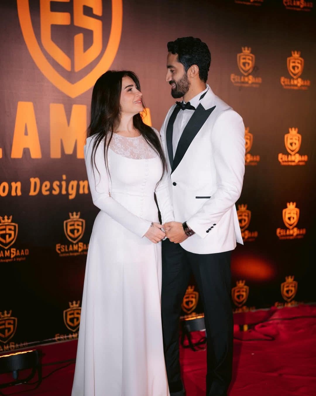 مي عز الدين وزوجها