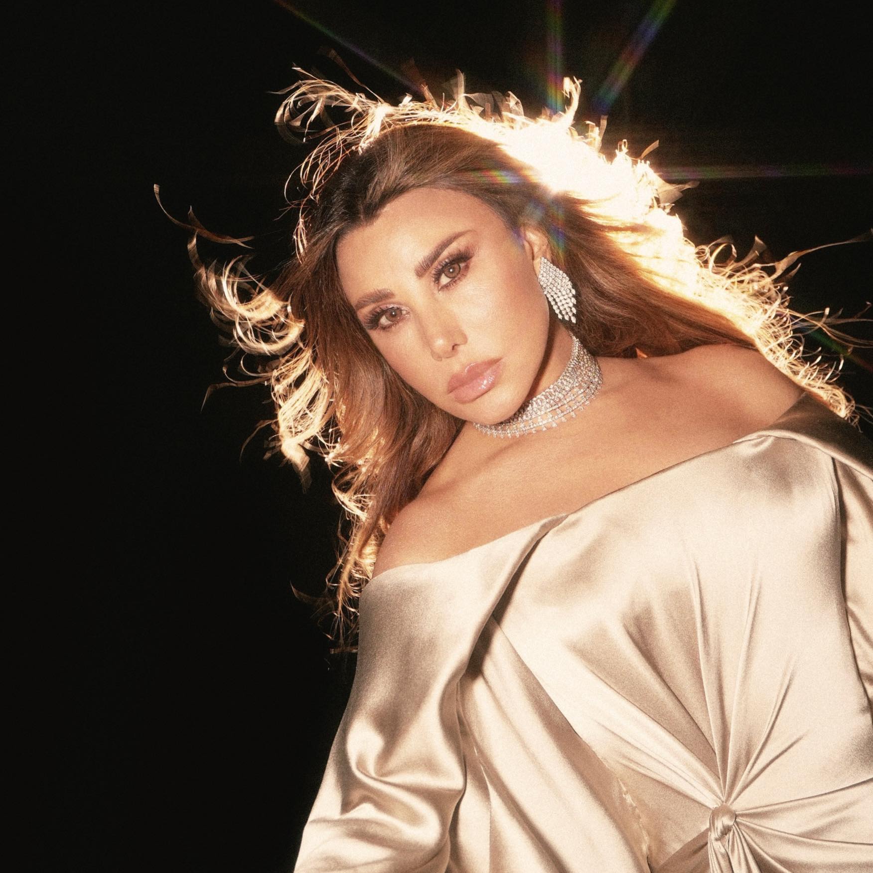 نجوى كرم بمجوهرات الألماس البرّاقة من توقيع دار مجوهرات نصولي Nsouli Jewelry