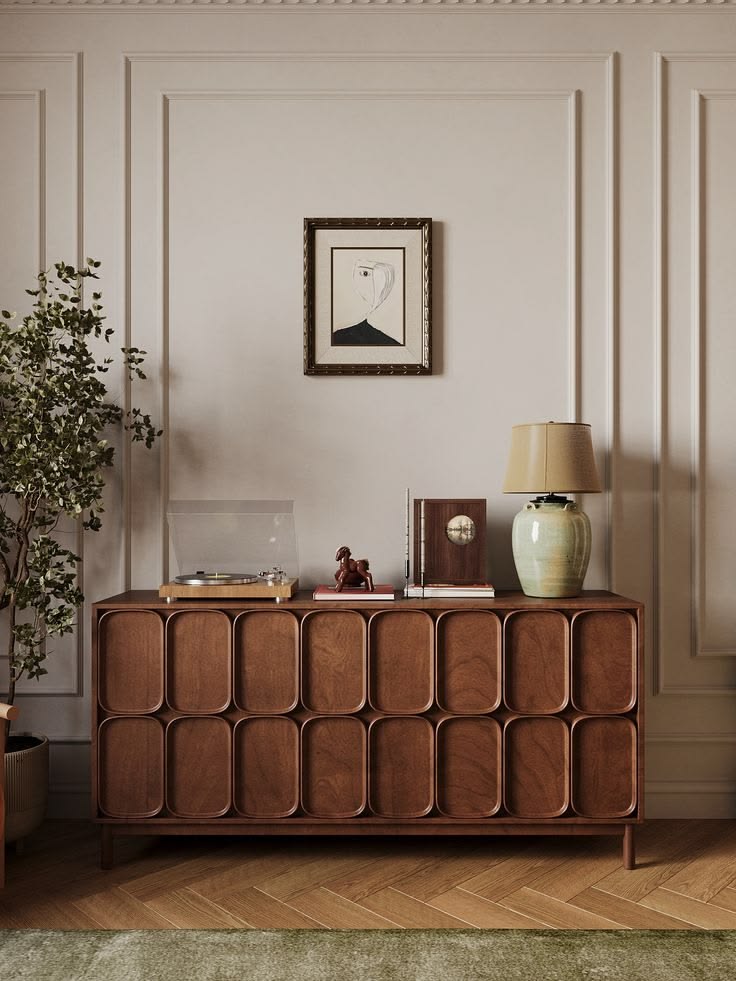 ينصح الخبراء بالاستثمار في خزانة جانبية فينتدج بتصميم بياني