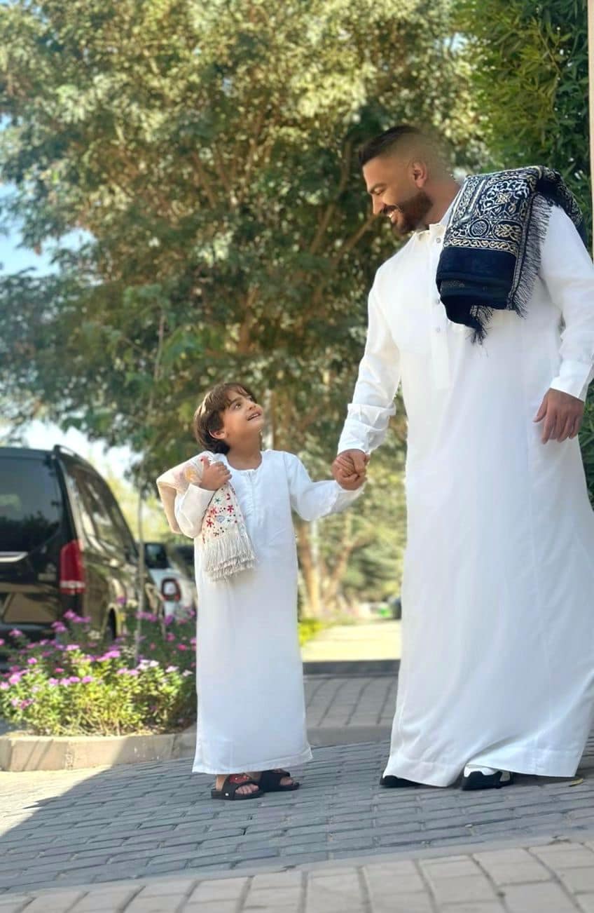 تامر حسني وابنه آدم