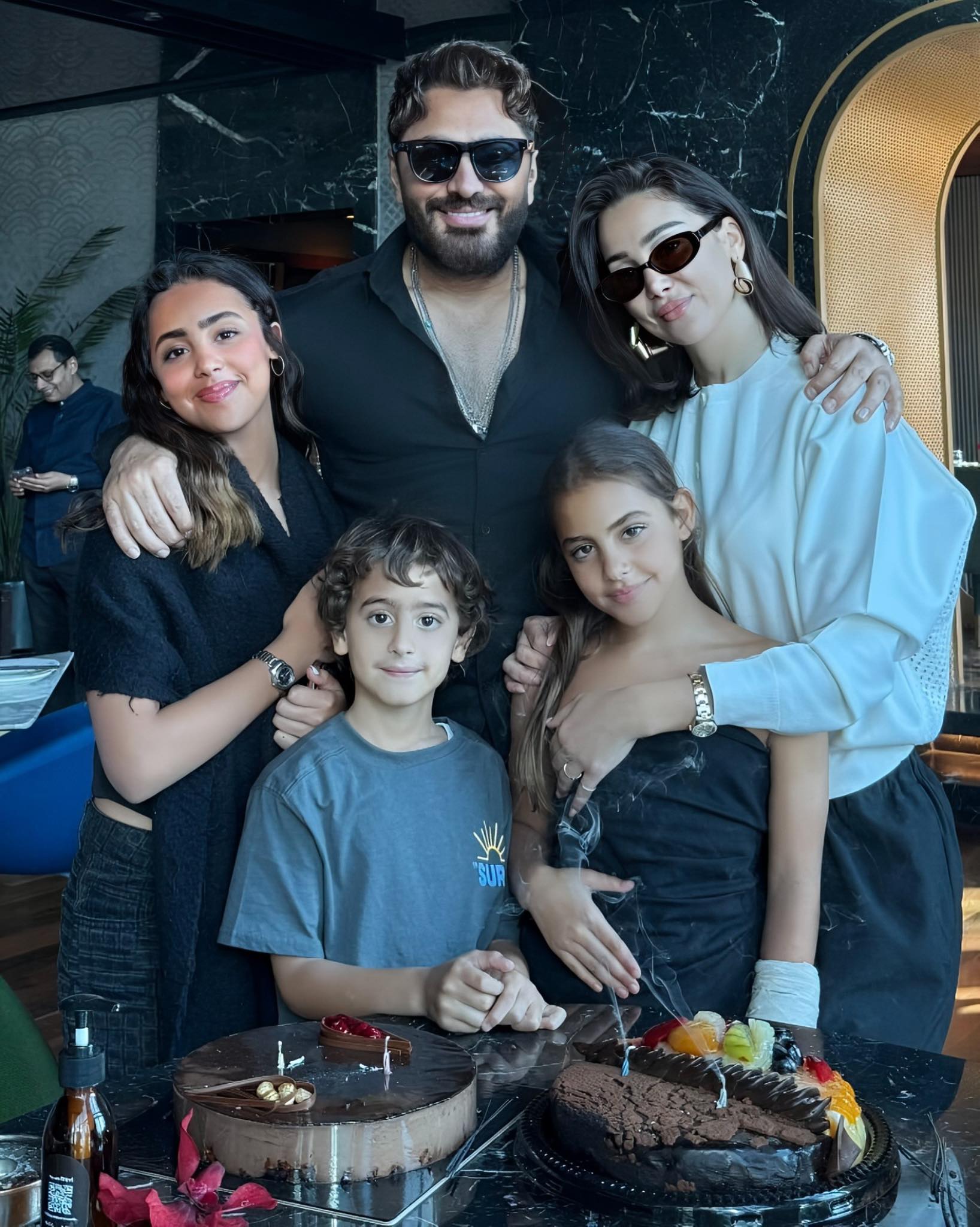 بسمة بوسيل وتامر حسني وأبنائهما