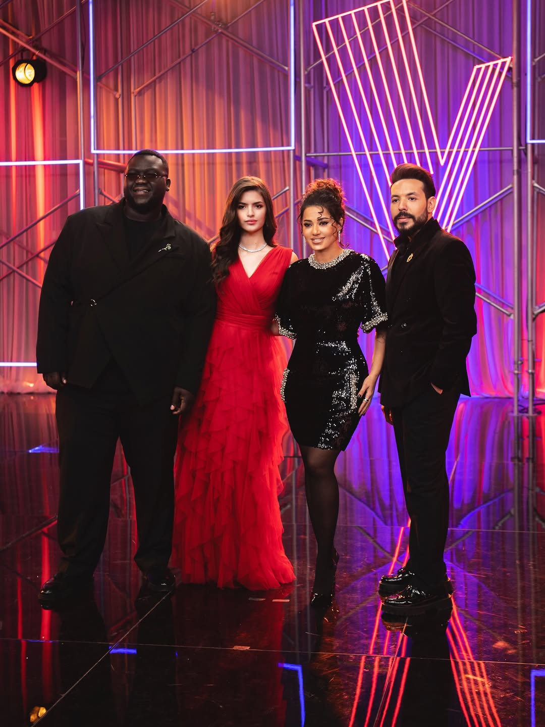 رحمة رياض مع فريقها