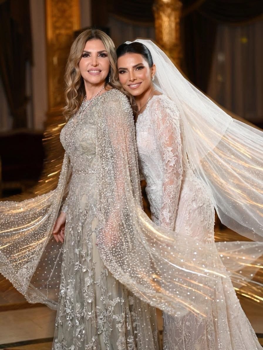 تناغمت إطللالة نادية مصطفى مع اطلالة العروس