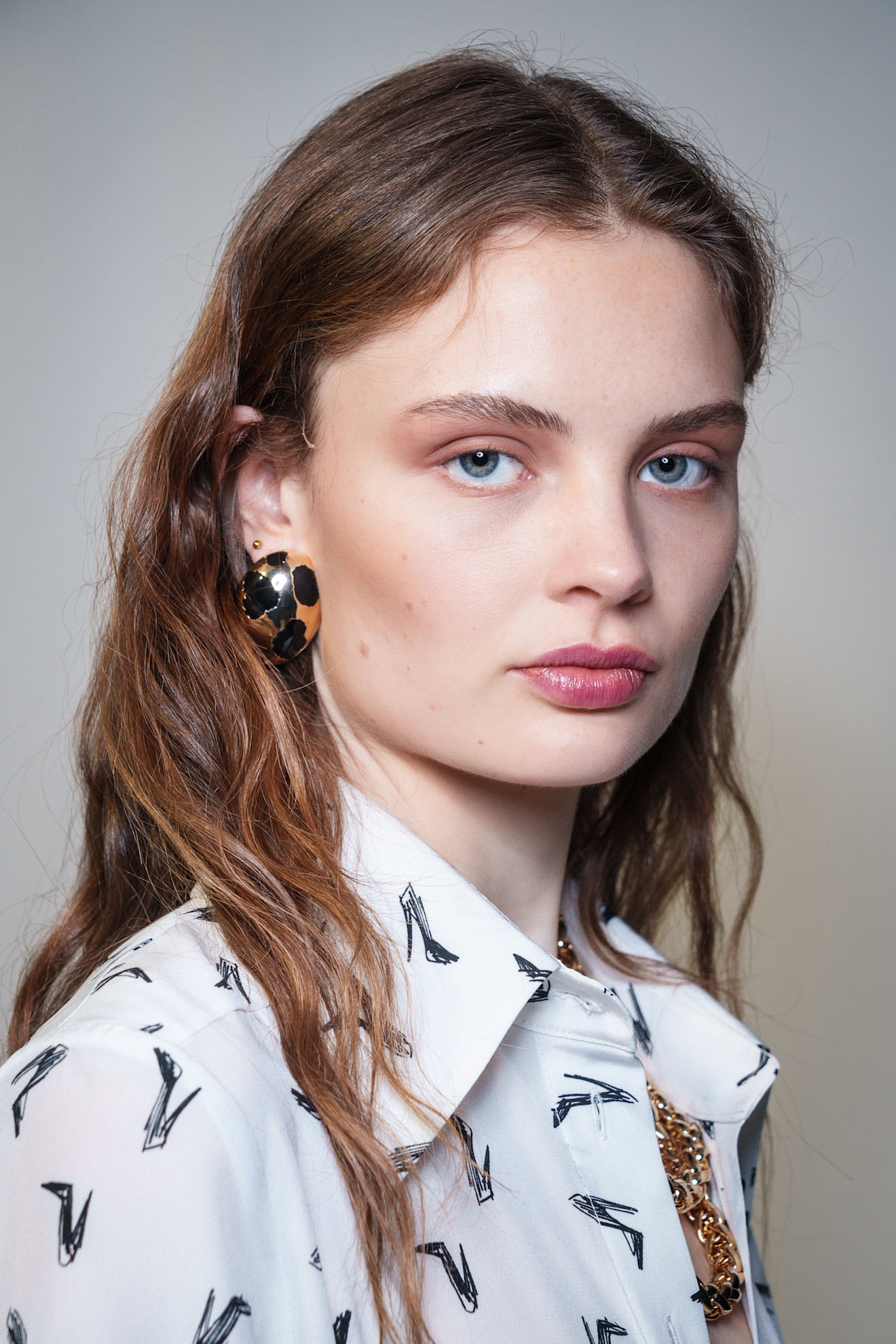 رسمات المكياج الملون مع التموجات المشمشية