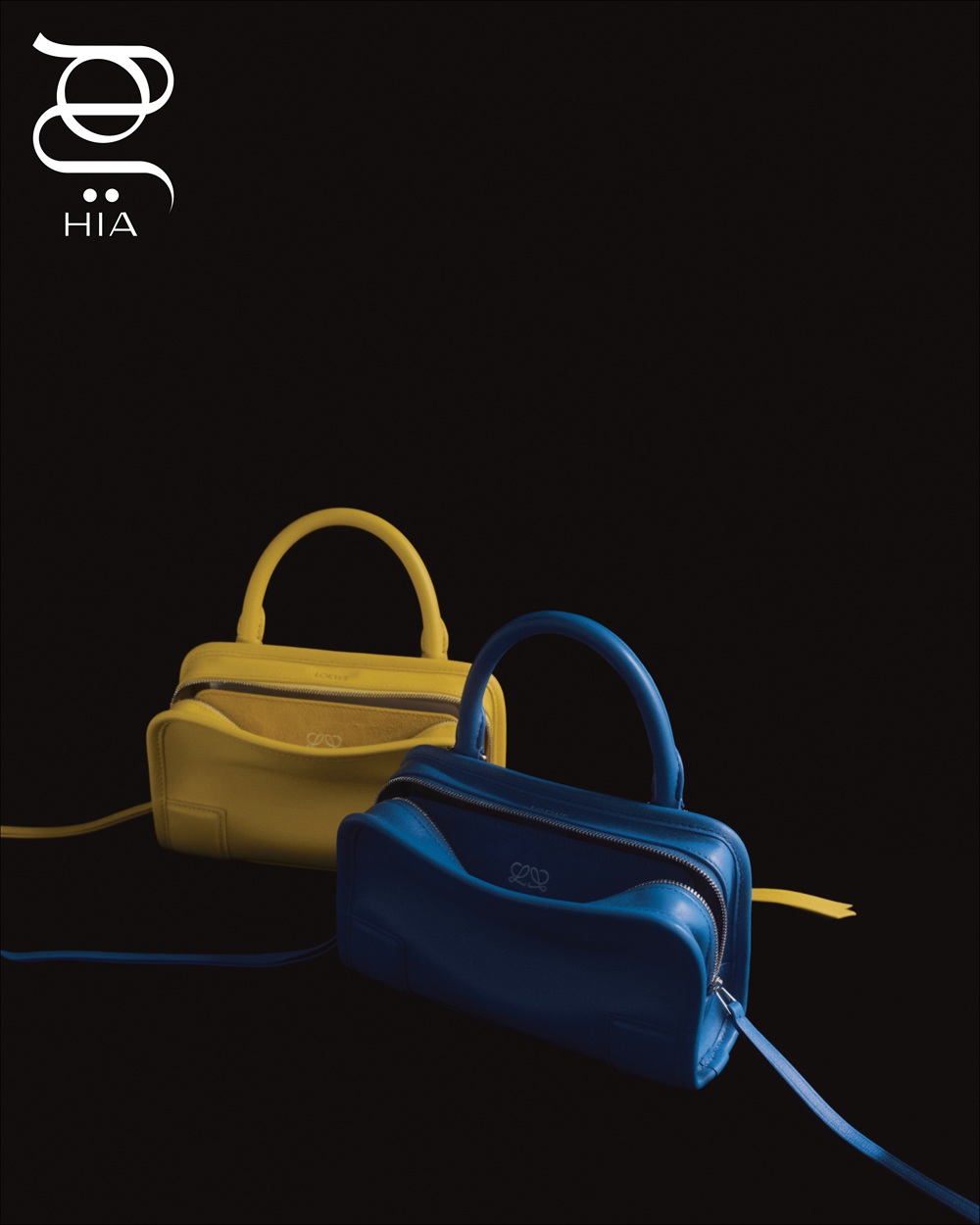 حقيبتا "ميني أمازونا 180" 180 AMAZONA MINI من جلد العجل الناعم باللونين الأصفر والأزرق من دار "لويفي" LOEWE