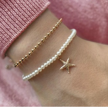 Pearl & Star Strand Bracelet  من Lynor