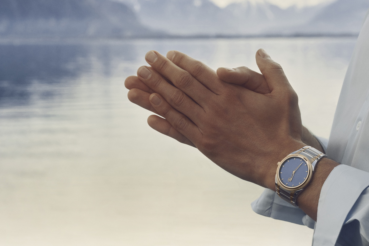 ساعة Tonda PF Micro-Rotor من الفولاذ والذهب الوردي مع مينا أزرق.