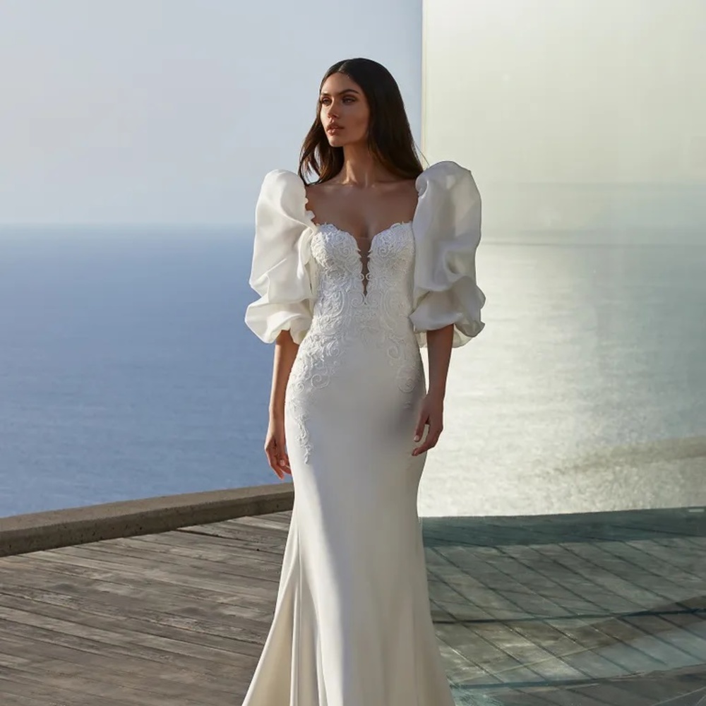 فساتين زفاف بقصة الحورية@pronovias
