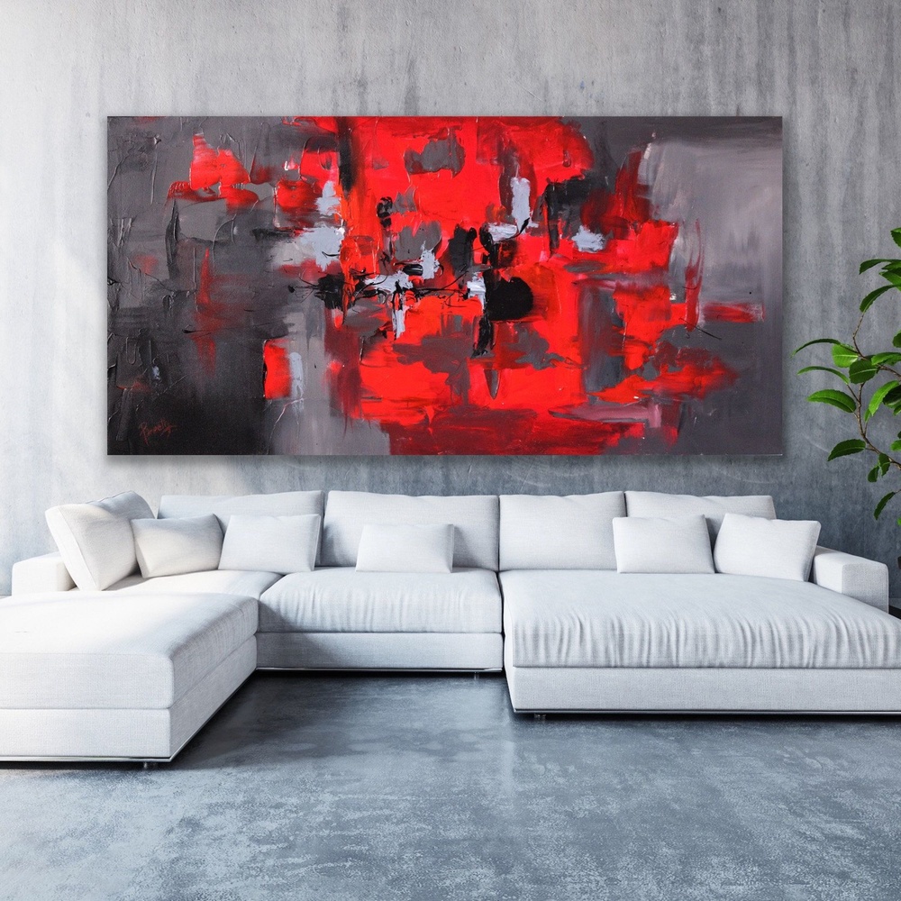 الأحمر يجذب الأنظار ويكسر روتين الألوان الحيادية في الديكور