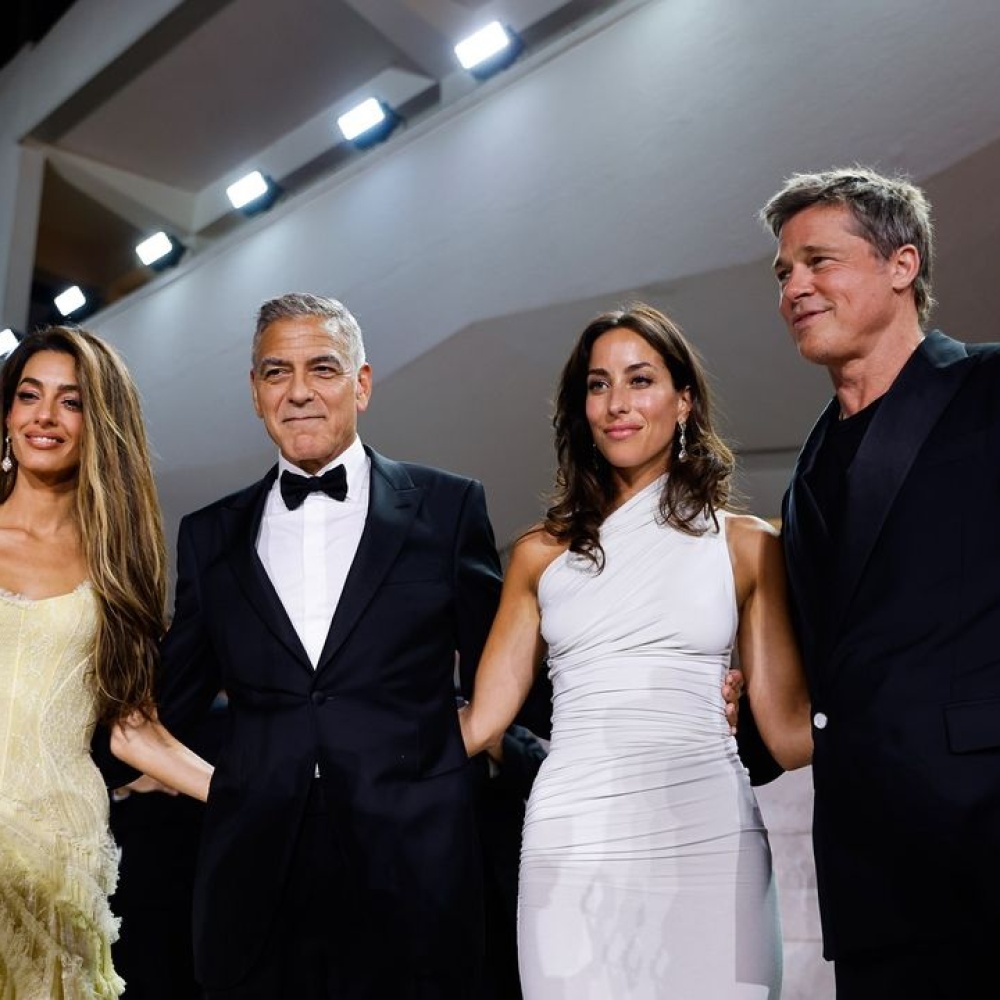 جورج وأمل كلوني وبراد بيت وشريكته في فينيسيا