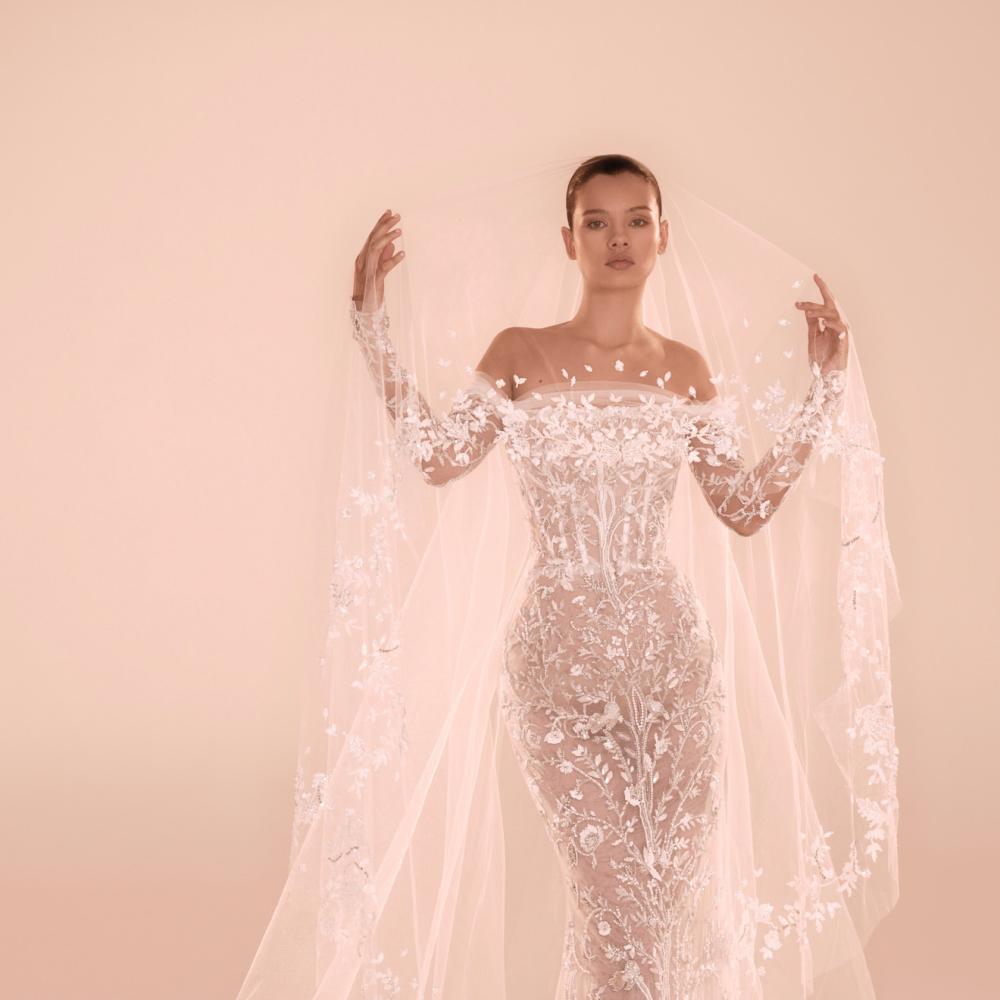 فستان زفاف بالأبيض الثلجي في عروض زهير مراد