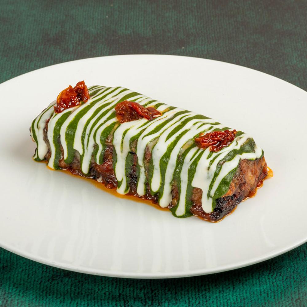 بارميجيانا الباذنجان مع كريمة البوراتا وبيستو الريحان