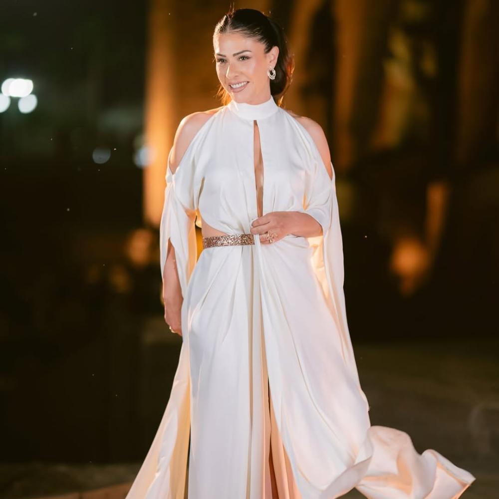 بسمة ترتدي فستانا رقيق بصيحة الـCut out3