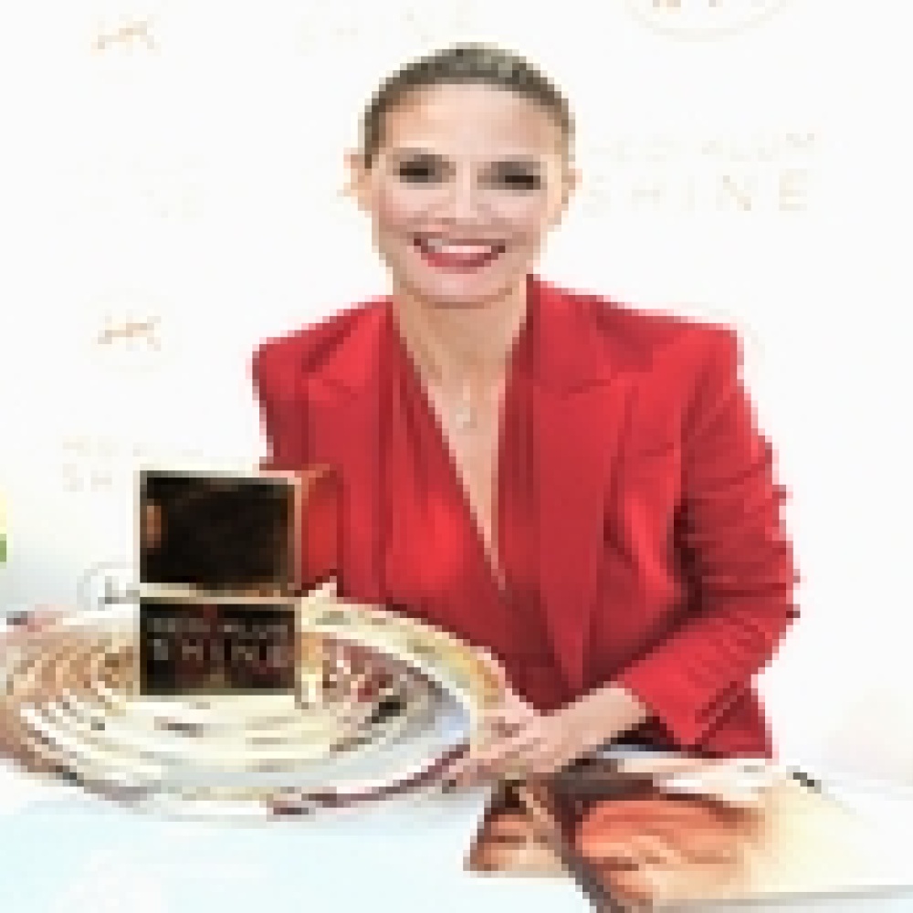 هايدي كلوم تطلق عطرها الخاص "Shine"