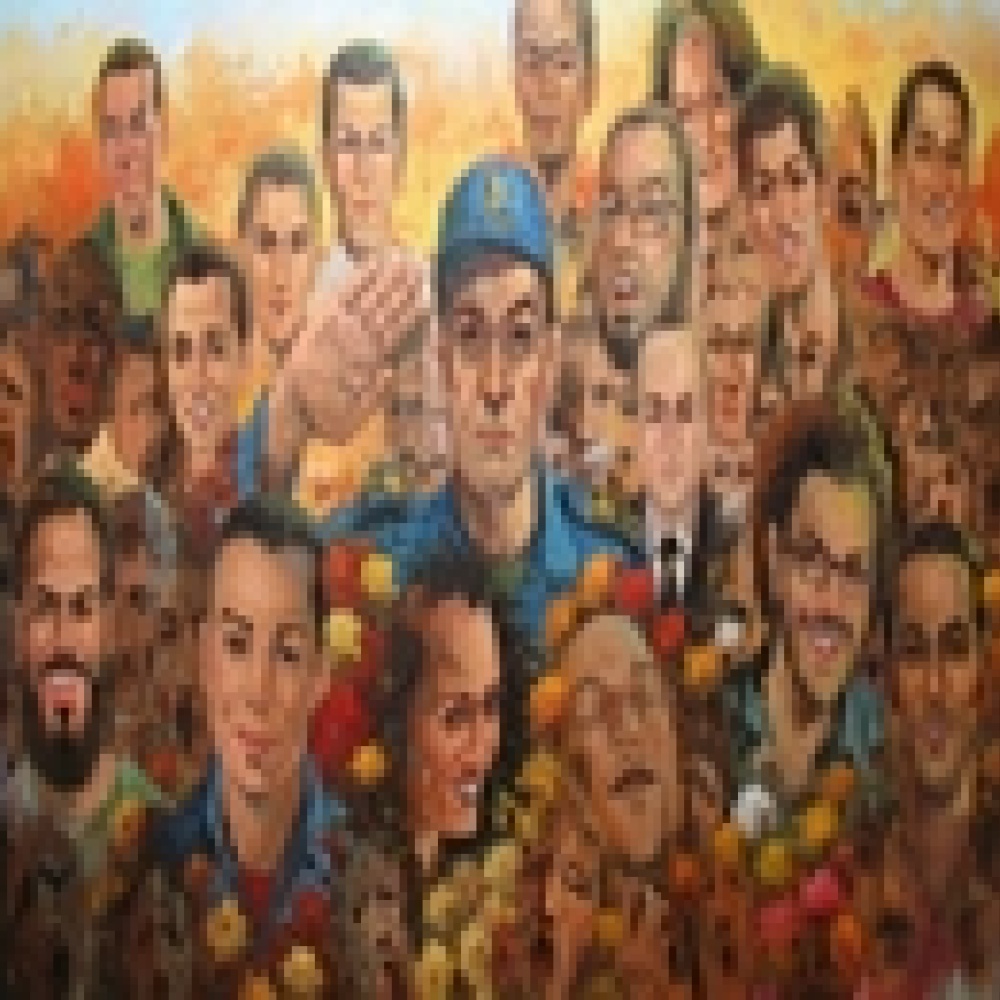 طه القرني يواصل العمل بجدارية الثورة العملاقة