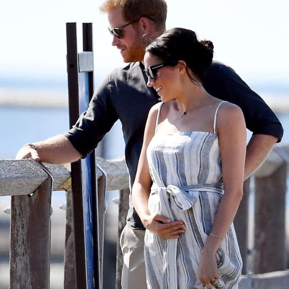 ميغان ماركل لا يمكنها اخفاء سعادتها بعد ظهور ملامح الحمل خلال زيارتها لأستراليا