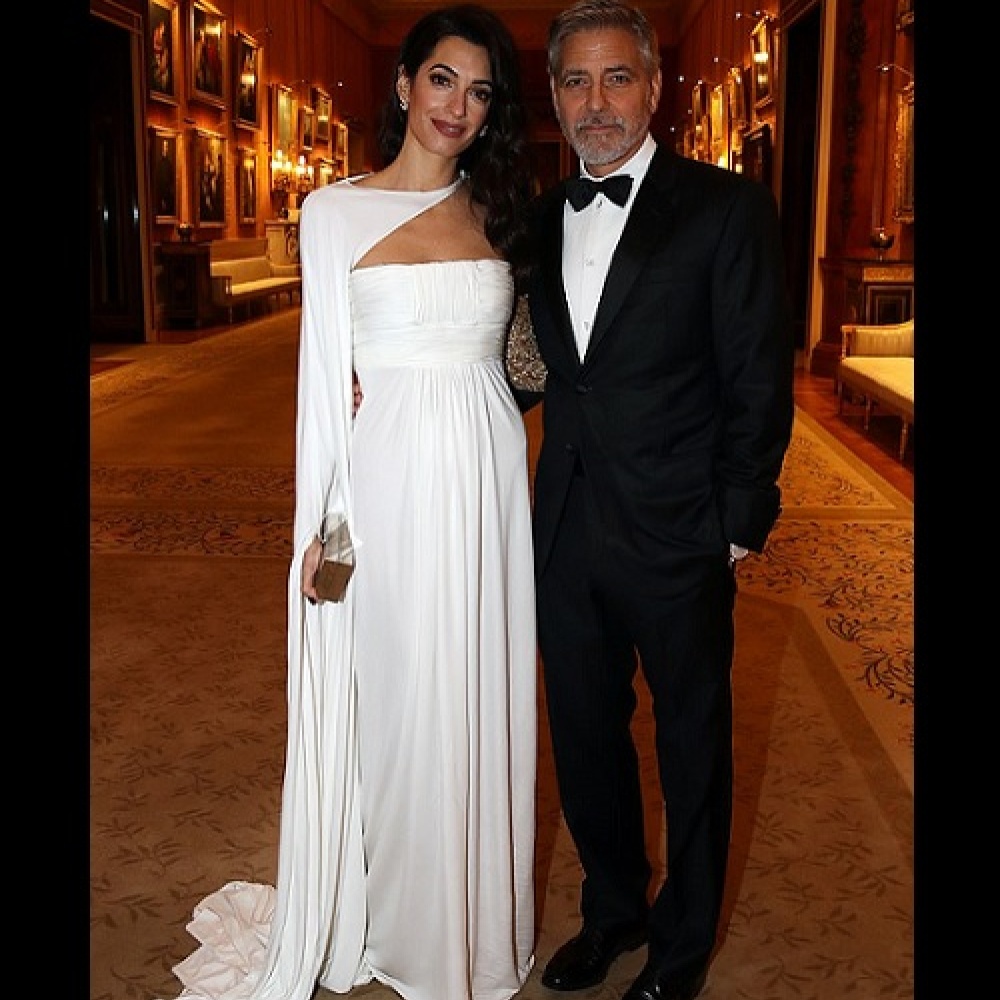 إطلالة أنيقة لأمل كلوني وزوجها جورج اثناء لقائهما الأمير تشارلز في لندن