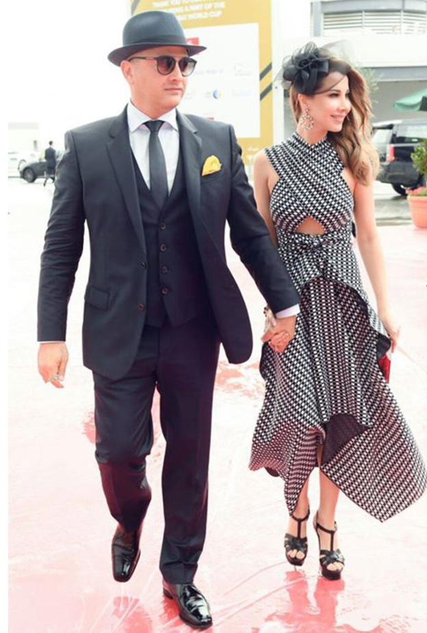 نانسي عجرم بموض‎ ‎‏ الفستان المقلم بين الأبيض والأسود من برونزا سكولير ‏PROENZA SCHOULER