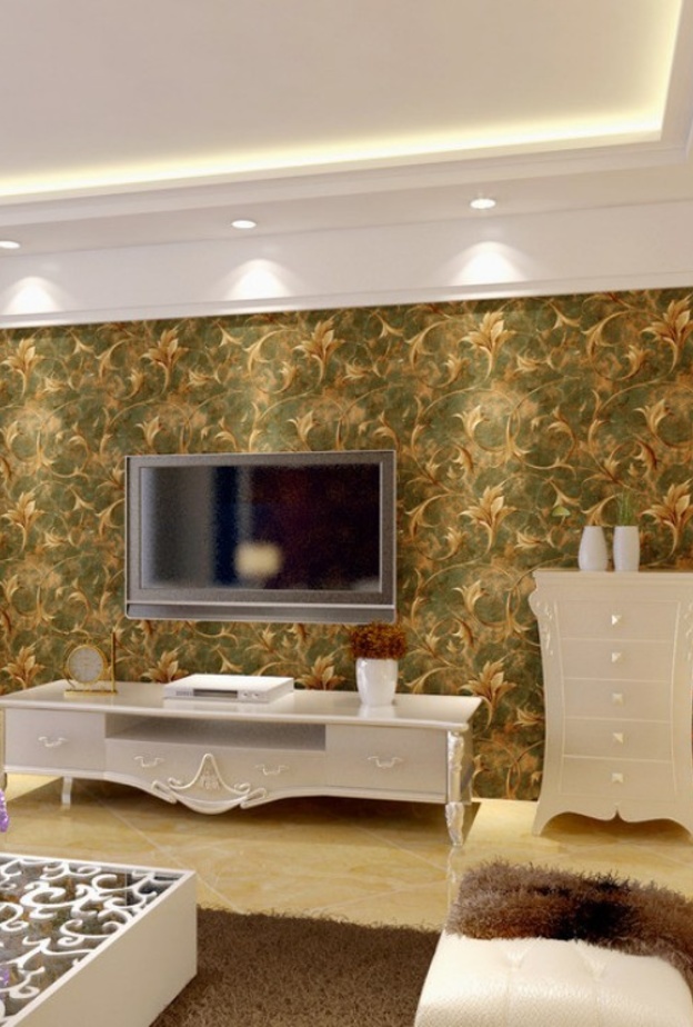 اختيار منسجم لورق الجدران على الجدار خلف التلفاز ليلائم بتدرجات ألوانه الورق المختار على الجدار المجاور 