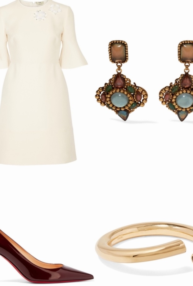 اطلالة راقية  بفستان أبيض أنيق