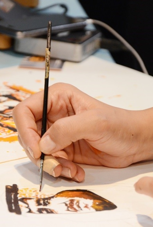 الرسم بالقهوة في المعرض السابق 