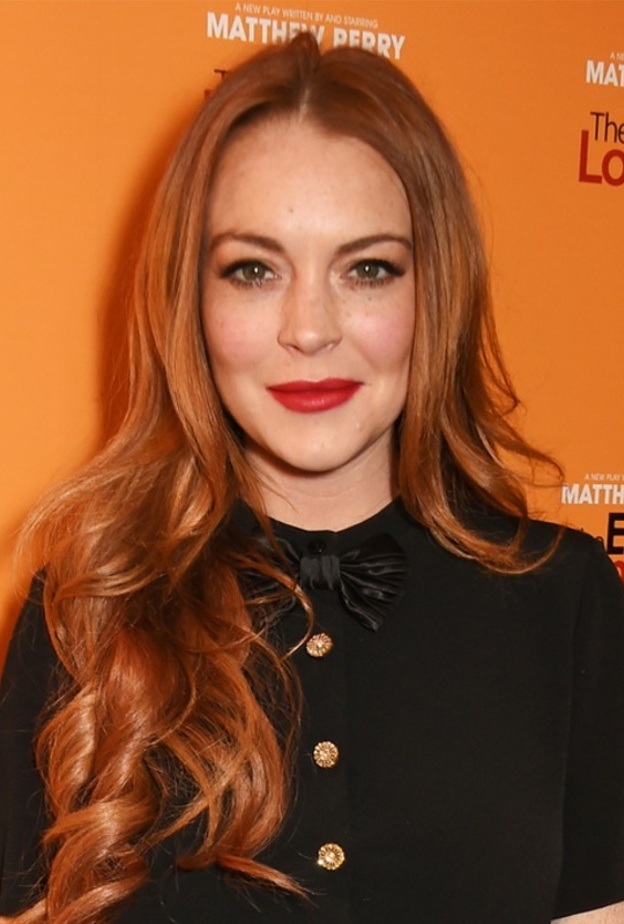 ليندسي لوهان تعتذر عن اتهام خطيبها بالخيانة