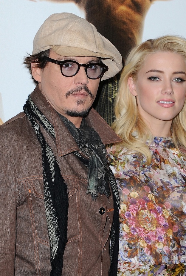 شاهدة عيان تؤكد تعدي جوني ديب على امبر هيرد