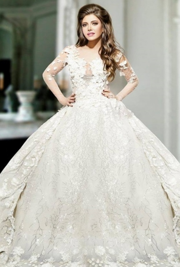 ريهام حجاج فاجأت الجمهور بصورها وهي ترتدي فستان زفاف