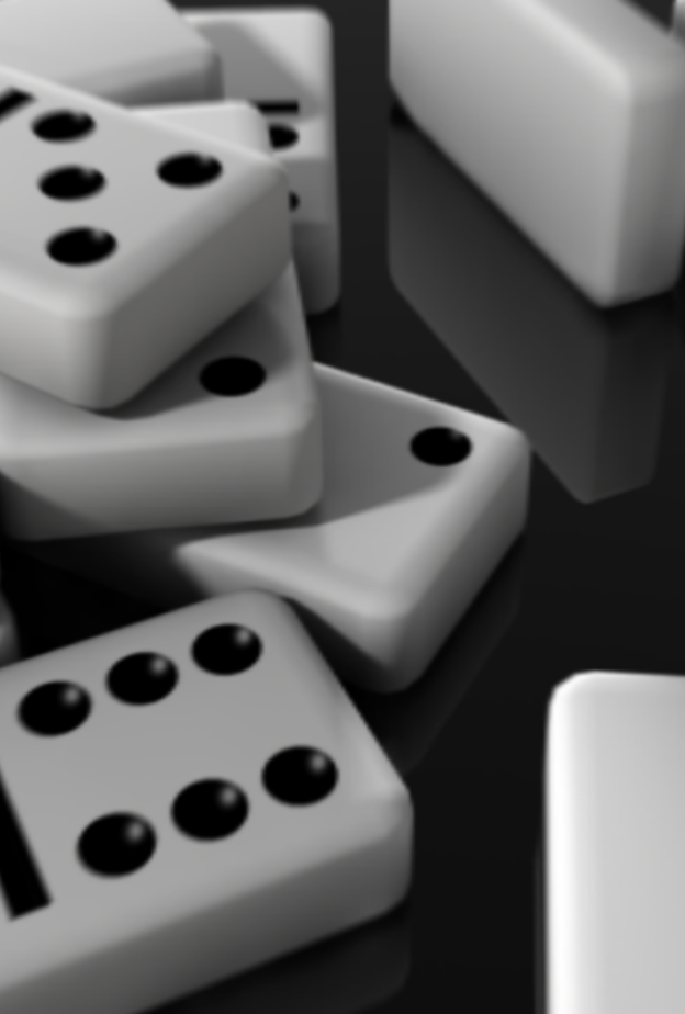 عمال يبنون جدارا على طريقة أحجار الدومينو