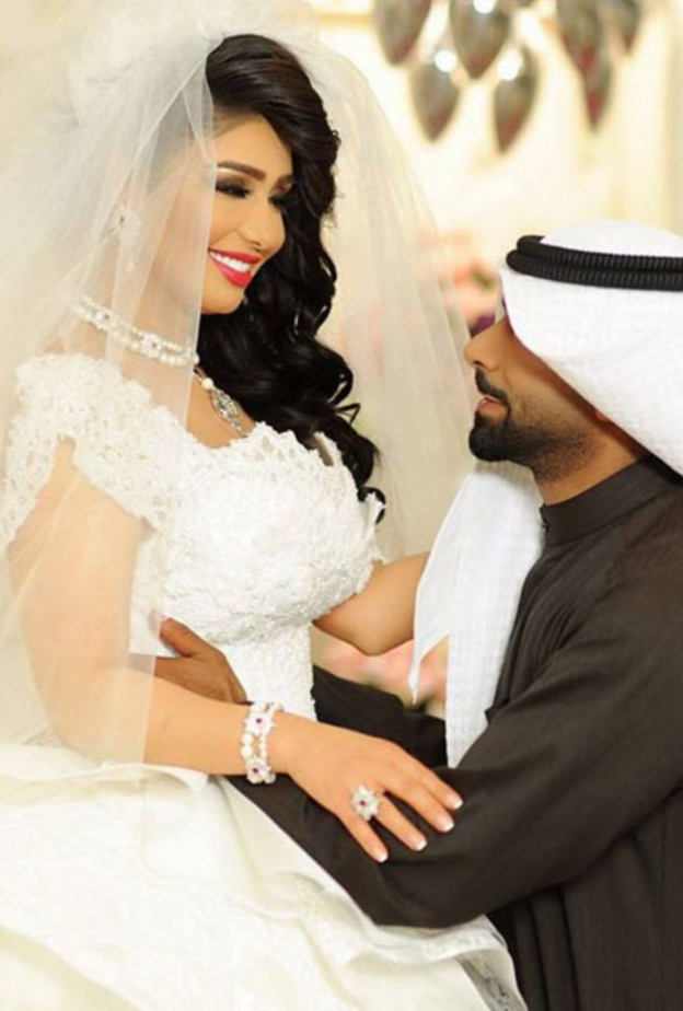 هنادي الكندري وزوجها