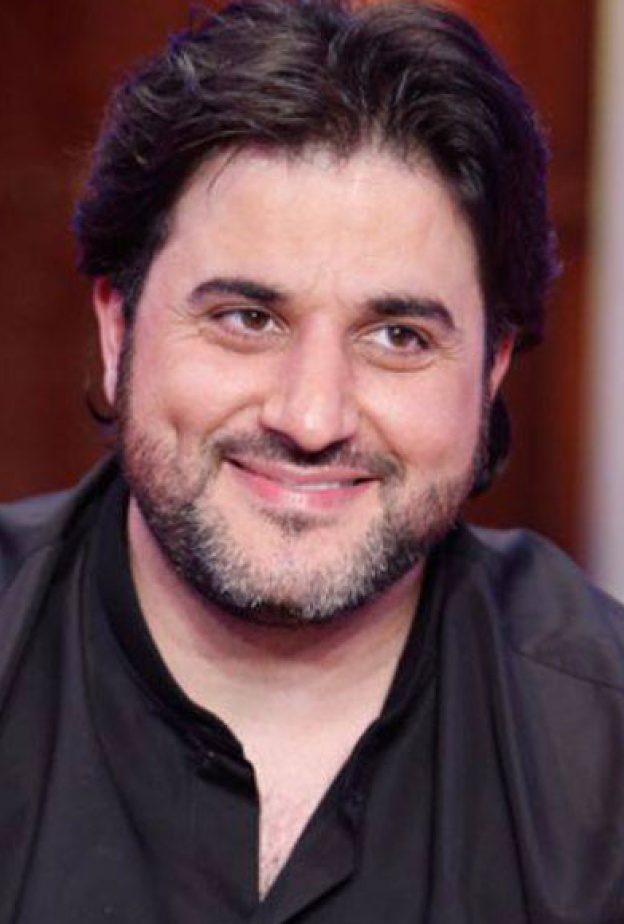 ملحم زين برفقة ولديه