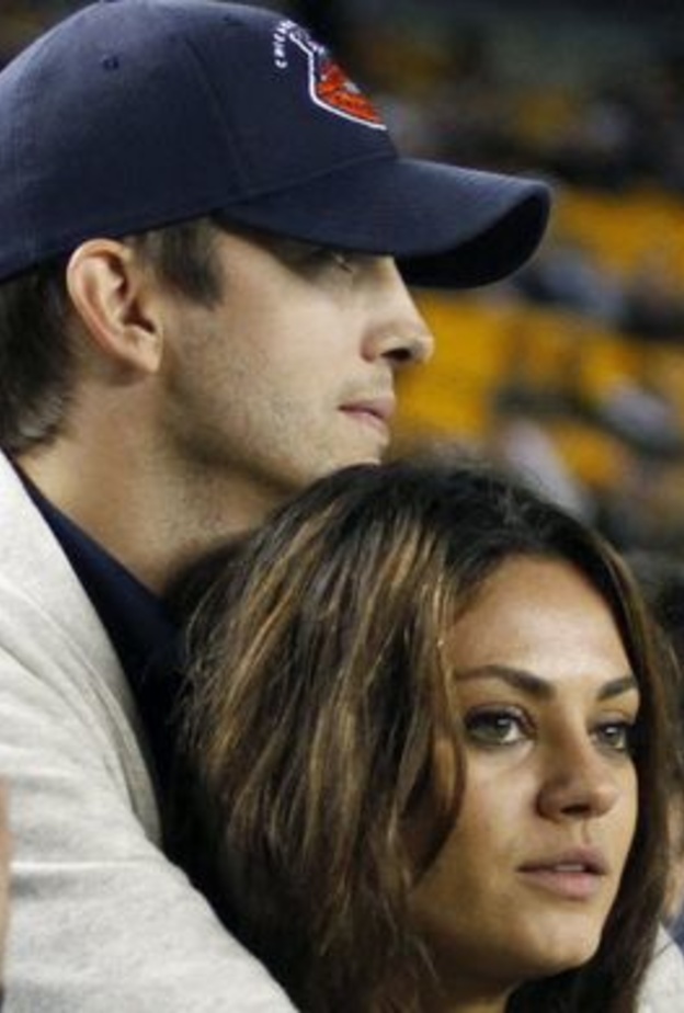 ميلا كوينس وآشتون كوتشر