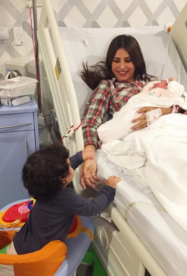 ريهام أيمن وابنيها