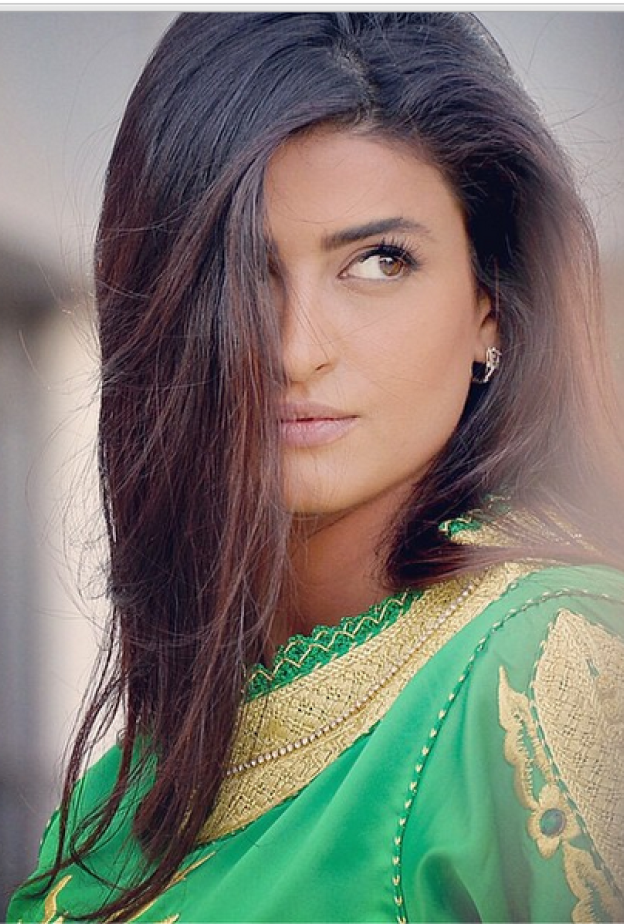  علا فارس تختفل بالعيد الوطني السعودي بالزي الاخضر